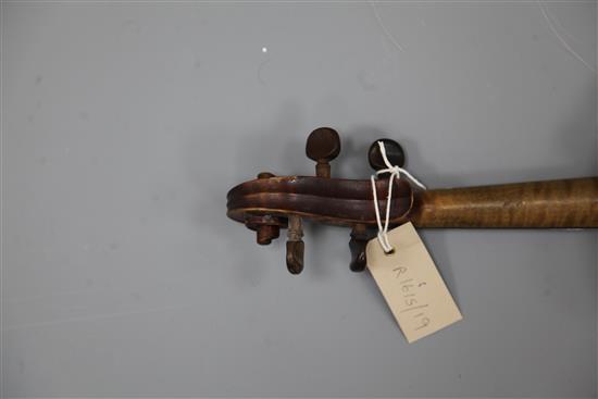A violin with two piece back, bearing label for Petrus IO.. Mantegalia Mediolani, overall 23.5in., cased with bow